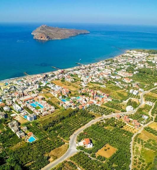 Aerial view of Agia Marina with Thodorou island offshore